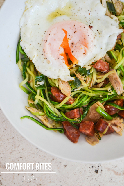 zucchini courgette noodles with chicken chorizo and fried egg paleo