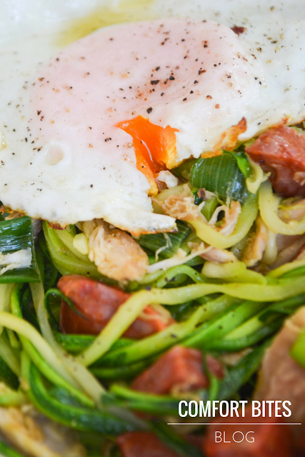 zucchini courgette noodles with chicken chorizo and fried egg paleo