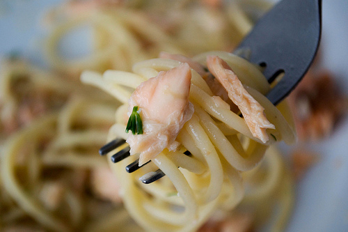 spaghetti with trout and vodka on fork