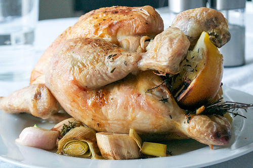 aromatic roast chicken with herbs, garlic lemon and wine